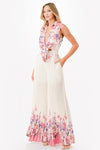 sleeveless pleated floral jumpsuit. Perfect vacation or brunch jumpsuit. 